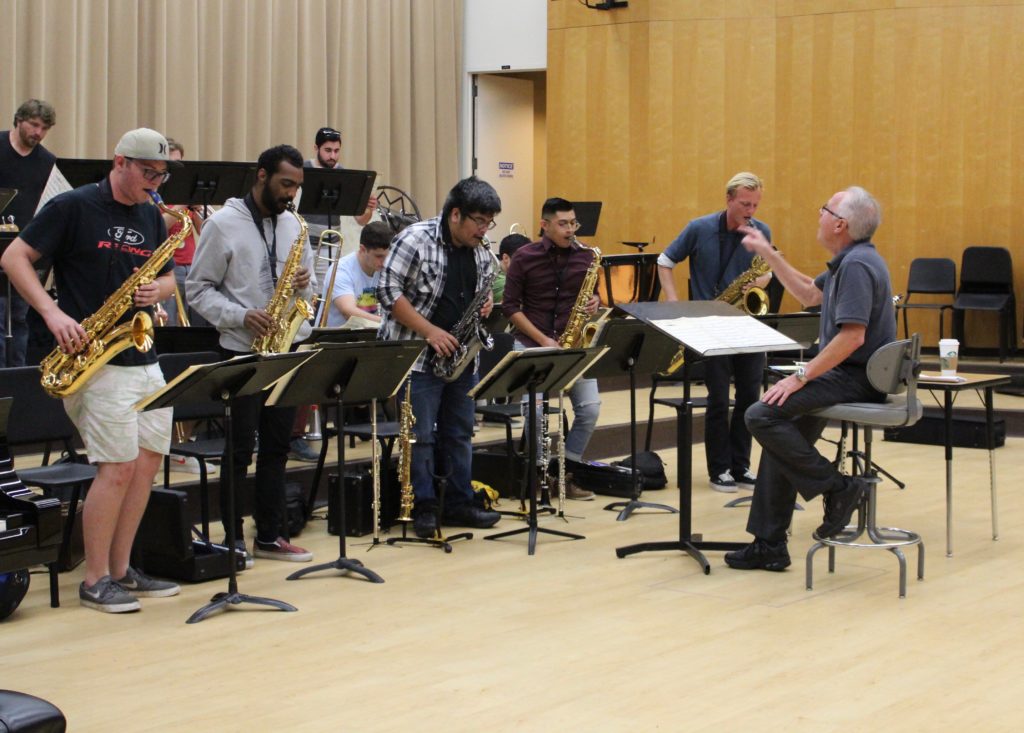 The Director of Jazz Studies, Bill Yeager, conducts the saxophone section of the jazz ensemble. 