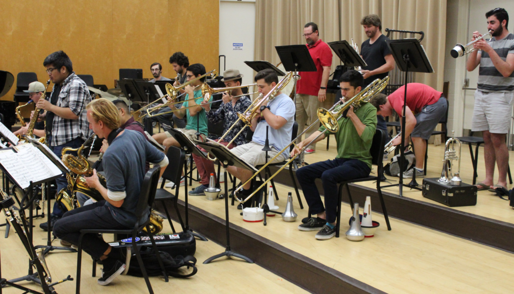 The Jazz Ensemble practicing on of their songs in M-114.