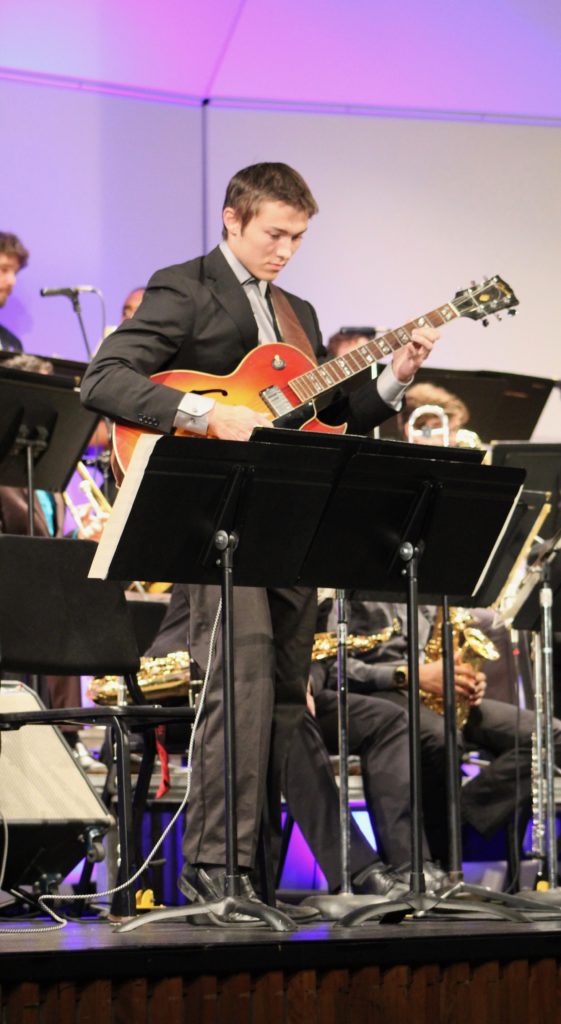 Alex Ciavarelli practices his solo with the Jazz Ensemble in the Smith Recital Hall before a concert. Photo by Angelica Wallingford  